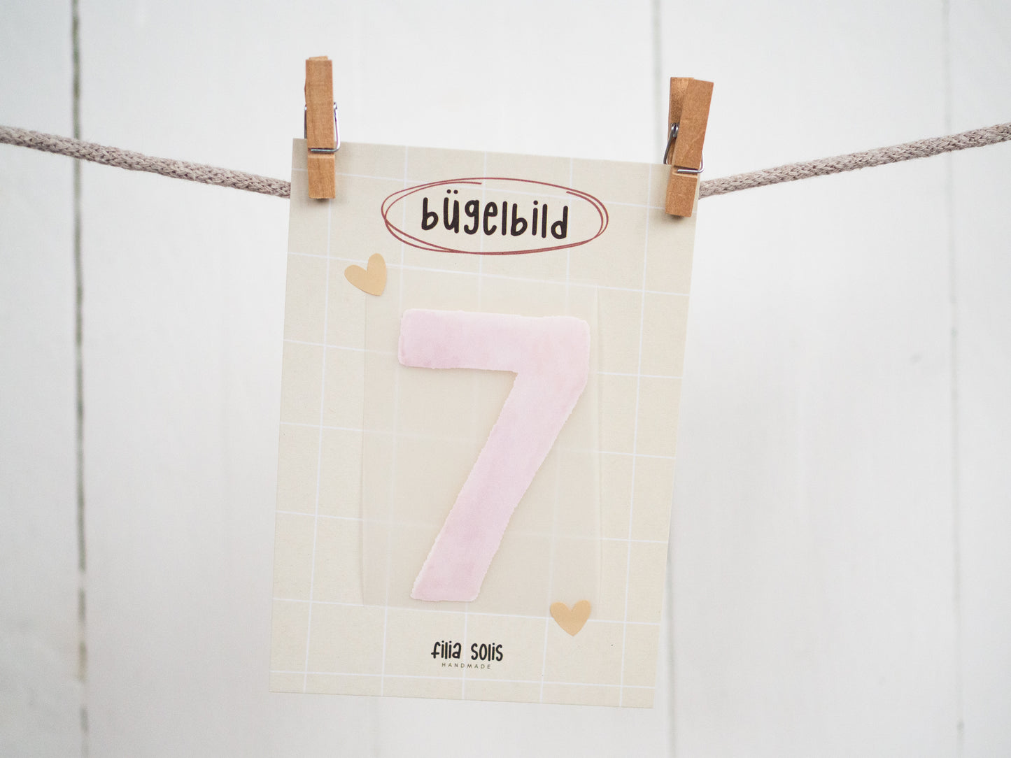 Bügelbild sieben (hellrosa)