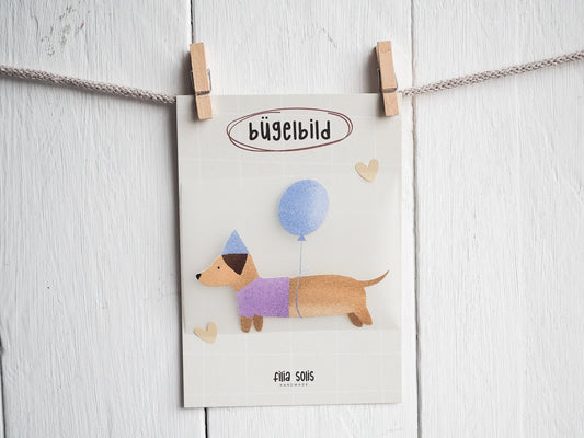 Bügelbild Dackel mit Ballon